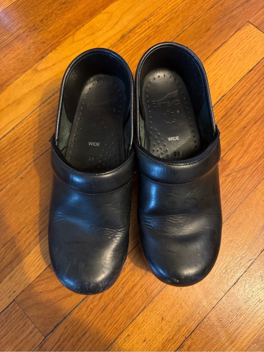 Dansko Black Leather Wide Slip-On Clogs - Women's